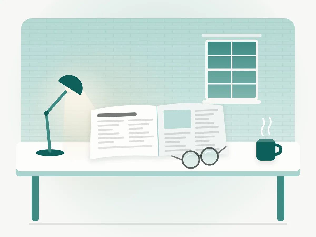 An open newspaper lies on a desk under a warm lamp, with reading glasses resting on it and a mug beside it.